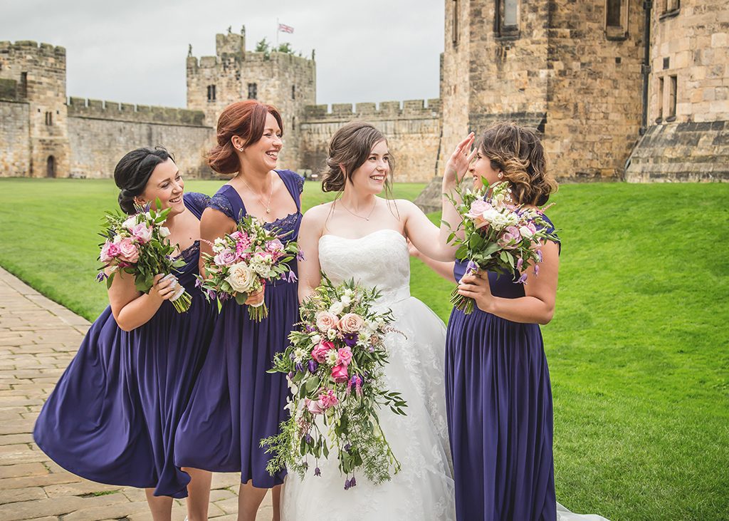 bride and bridesmaids at alnwick castle