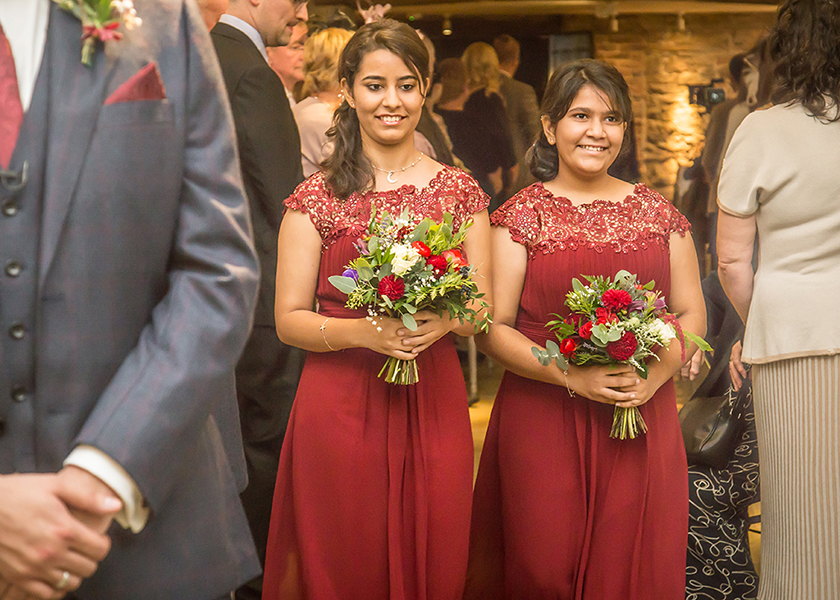 bridesmaids in red