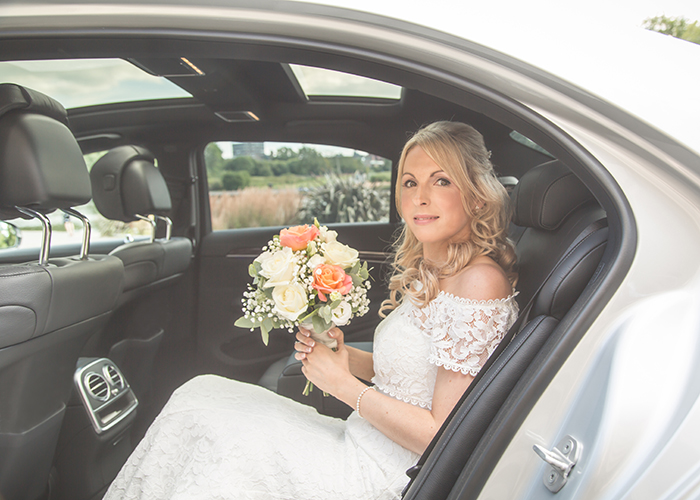 bride arriving in wedding car