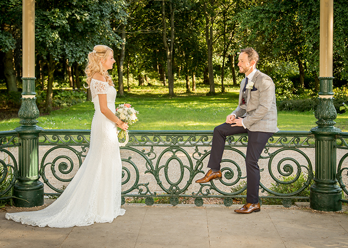 bride and groom in bandstand
