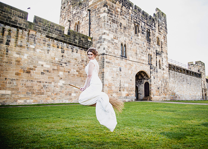 bride flying broomstick at alnwick castle