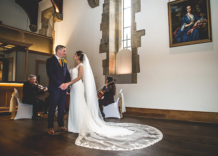 bride and groom in front of string quartet